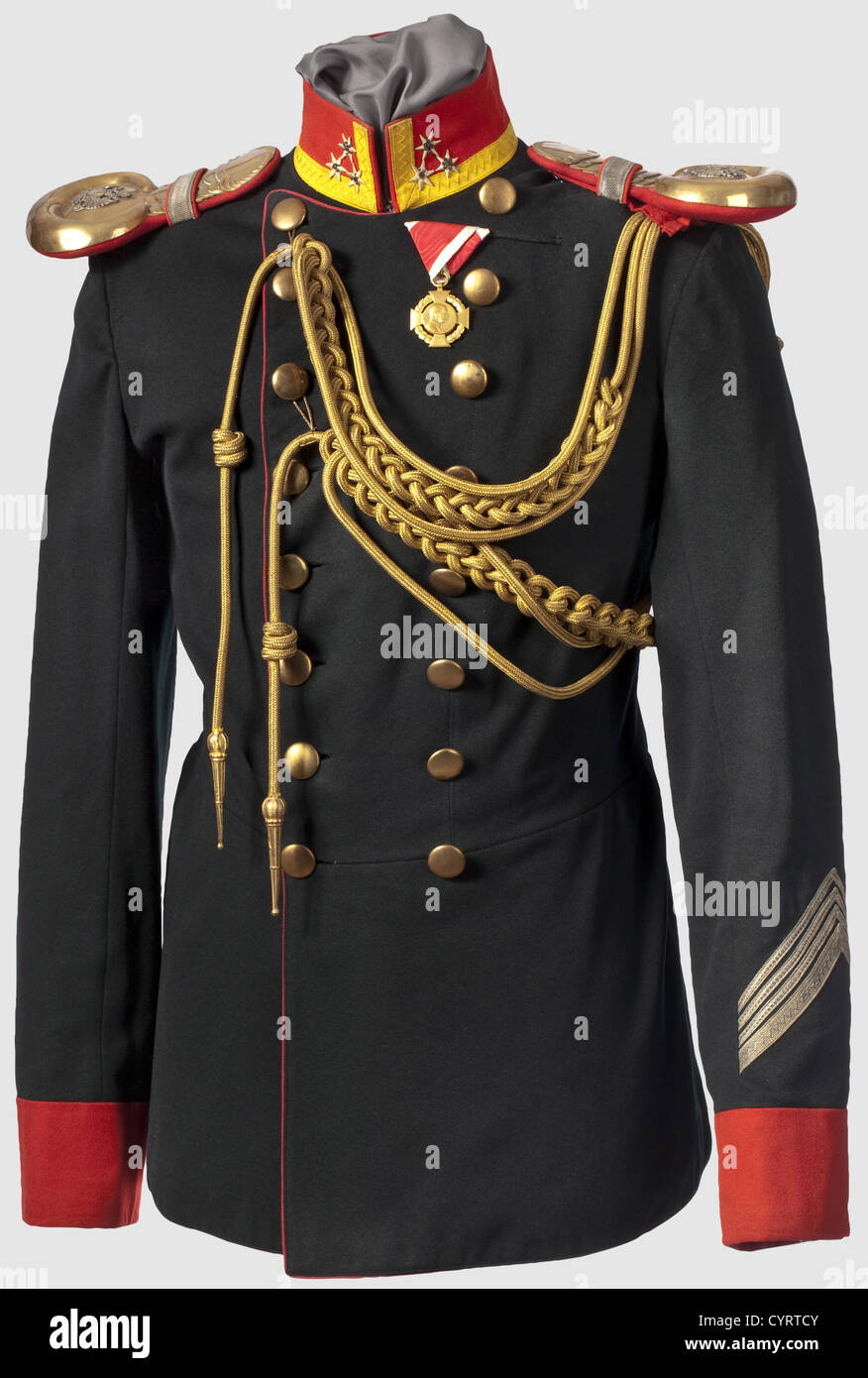 An Imperial and Royal Life Guard - Mounted Squadron jacket,uniform jacket for a Wachtmeister(staff sergant)Dark green cloth,the collars and facings in fine scarlet red cloth.The left sleeve with a gold-bordered triangle,awarded to long service NCOs.The gold epaulettes with red underlay and applied double eagle,and the corresponding gold aiguillette is included.Brown linen liner with depot stamp 'CB 1915' in a box.In very beautiful condition with minimal signs of use.The uniform tunics of the Life Guard Mounted Squadron and Infantry Company were ident,Additional-Rights-Clearences-Not Available Stock Photo