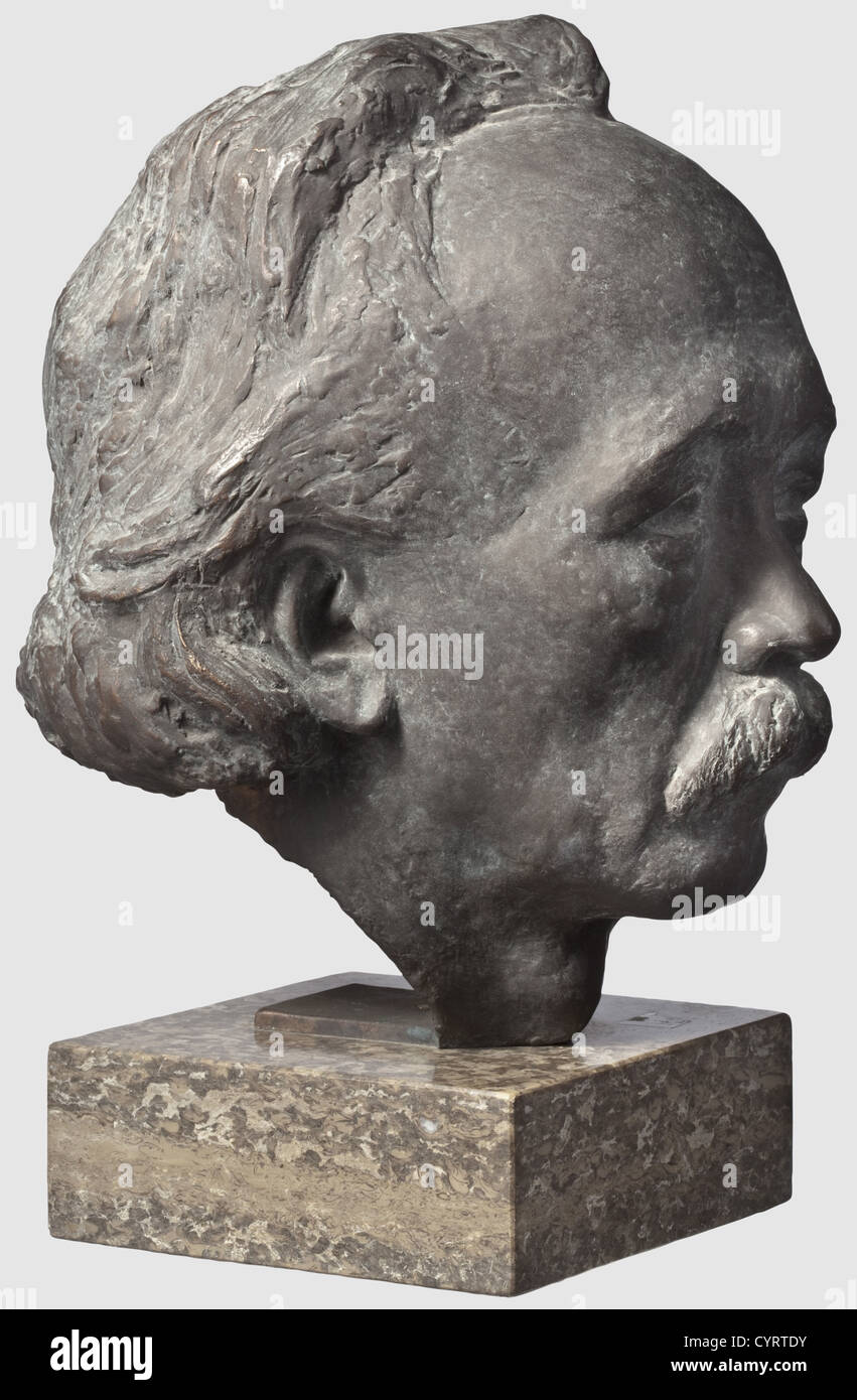 Professor Kurt Schmid-Ehmen (1901 - 1968), a bronze bust of the pianist and composer Josef Pembaur (1875-1950) Dark bronze head with high forehead and delicate facial features, signed 'Sch. E.', mounted on a grey, vividly structured stone plinth, overall height 38 cm. Also a bronze portrait plaque of Pembaur with Schmid-Ehmen's signature and the inscription 'Dresden April-Mai 1931', diameter 11.5 cm. With an official letter of purchase for a Pembaur portrait bust from 30th October 1940 by Gauleiter Adolf Wagner, a b/w picture of the bust and a b/w picture showi, Stock Photo