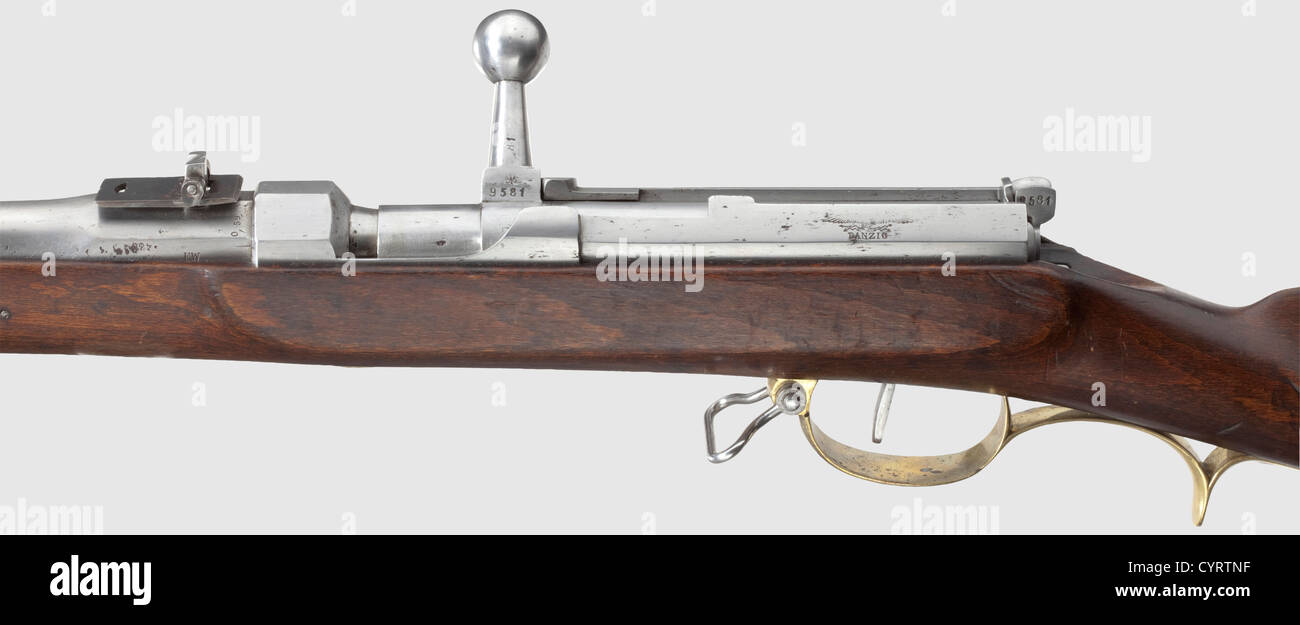 Needle rifle M 1841,Cal. 15.43 mm,no matching numbers,lock no. 9581,bolt receiver,screws etc. No. 9727. Bright 4-groove rifled bore,length 90 cm,several acceptance marks on the left in front of receiver,on right side marked '0,59' and 'FW'. Fixed rear sights with two folding leaves for cartridge M 1847. On left side of receiver marked 'Danzig' underneath eagle which is somewhat worn by cleaning,on the right acceptance marks and years '1858' and '1870'. Repaired needle,not original(?). Full stock with stamped brass furniture,unclear unit stamp '77...(,Additional-Rights-Clearences-Not Available Stock Photo