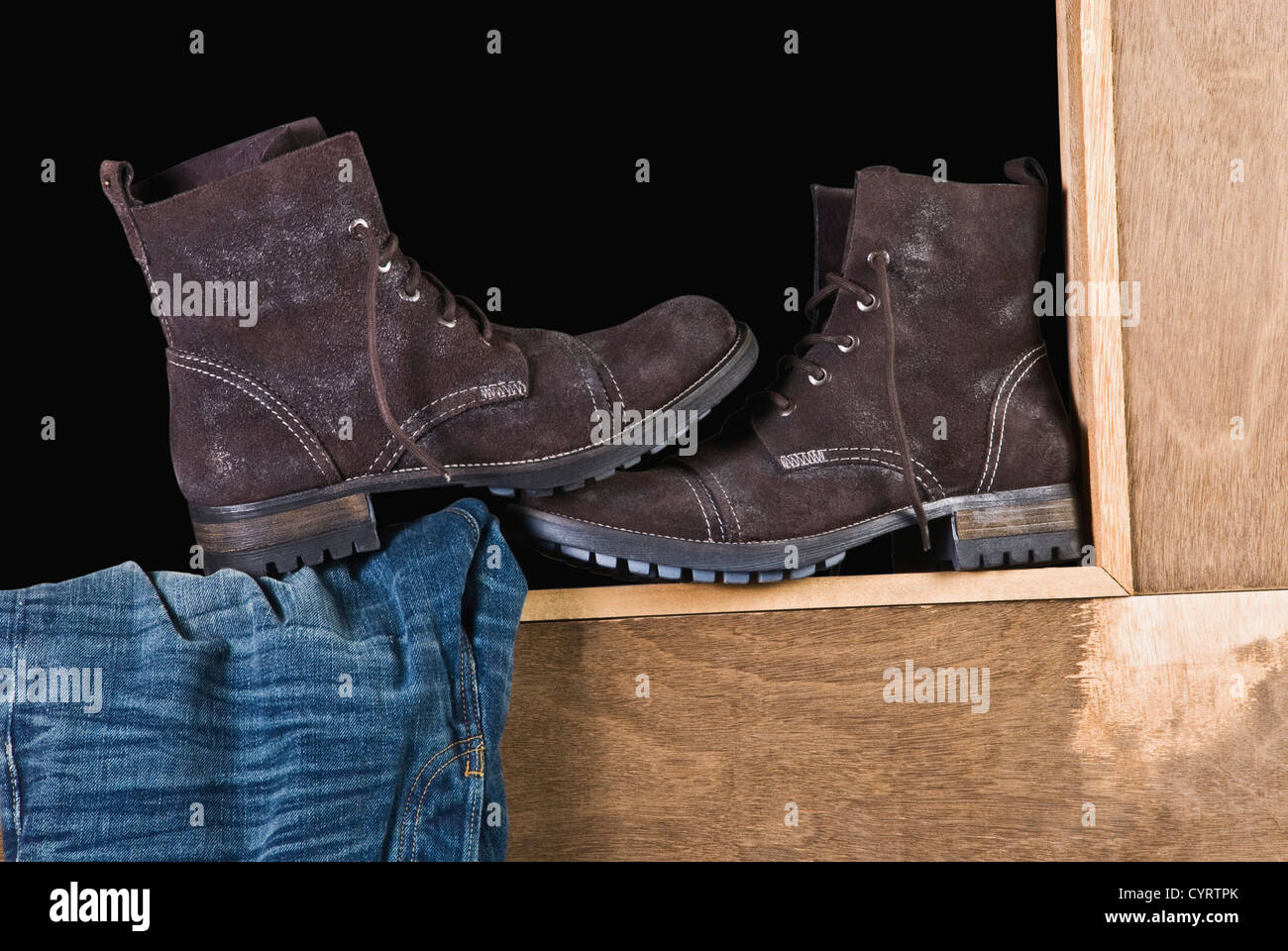 Closeup of a pair of hiking boots with jeans Stock Photo Alamy