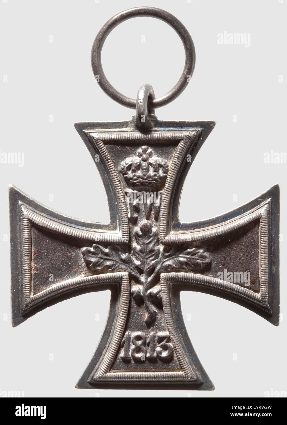 Iron Cross 2nd Class of 1813,Prussia,Wars of Liberation 1813 - 1815 Multi-piece fabrication from an early production series.Flat,stepped iron centre with silver border,the central reverse with three oak leaves and two acorns.The upper arm of the cross with crowned monogram 'FW' for Friedrich Wilhelm III,the lower arm of the cross with the year of institution,1813.The upper arm of the cross with a struck reinforcement for inclusion of the suspension ring eyelet.Dimensions: width 41.75 mm,height without ring 47.45 mm.Ring diameter 16.2 mm.Weight with,Additional-Rights-Clearences-Not Available Stock Photo