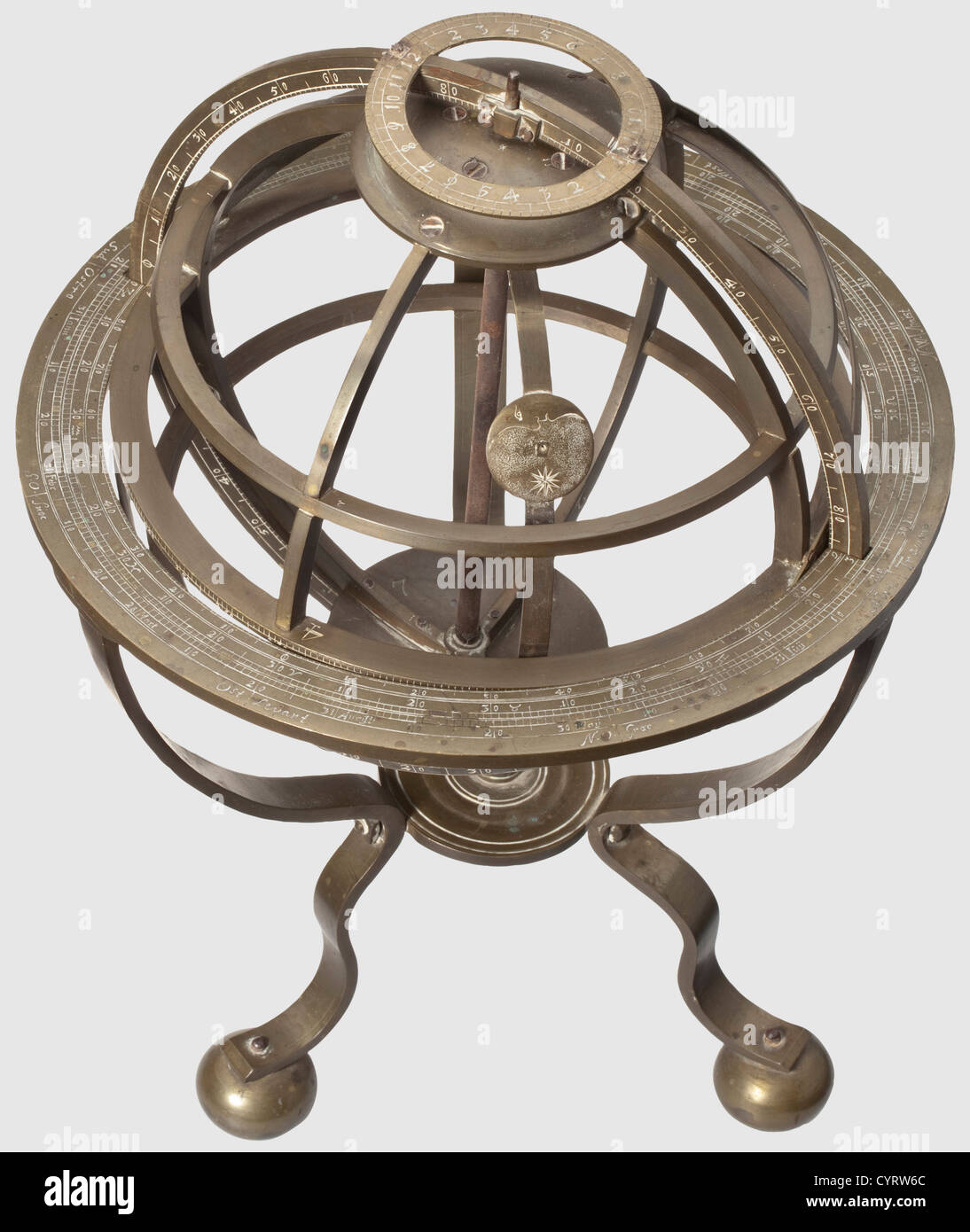A Flemish armillary sphere with ecliptic ring,18th century All-metal construction made from brass with dark age patina.Sphere with continuous horizontal bands at the equator and the tropics as well as markings for the polar circle.The equator band with finely engraved 360 degrees scaling.Ecliptic ring with scaling and astrological signs.Movable clasp with symbol for the moon on the inside.Tripod on ball feet,the fixation ring with elaborate,multiple scaling and the cardinal directions.Numbered parts,screws with dot markings.Some small parts missing.,Additional-Rights-Clearences-Not Available Stock Photo