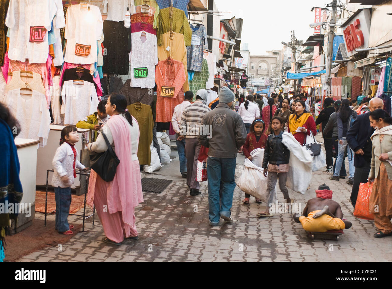 Group of people in a street market, New Delhi, India Stock Photo