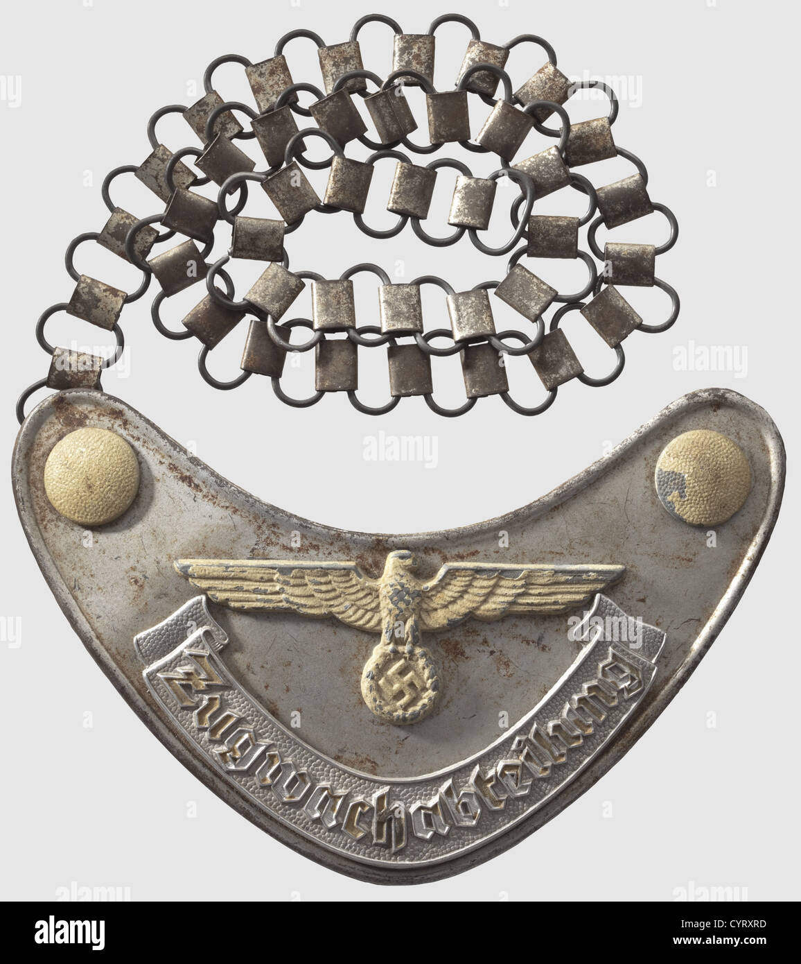 Wehrmacht, a gorget for Zugwachabteilung (train guard unit) Made of silver plated sheet iron, eagle, buttons and lettering coated with phosphorescent paint, all appliqués affixed by pins. Reverse cloth covering, one of the two securing hooks with maker 'M' in a square, iron chain for wear. Obviously used, in untouched original condition, historic, historical, 1930s, 1930s, 20th century, army, armies, armed forces, military, militaria, object, objects, stills, clipping, clippings, cut out, cut-out, cut-outs, insignia, symbols, symbol, emblem, emblems, Additional-Rights-Clearences-Not Available Stock Photo