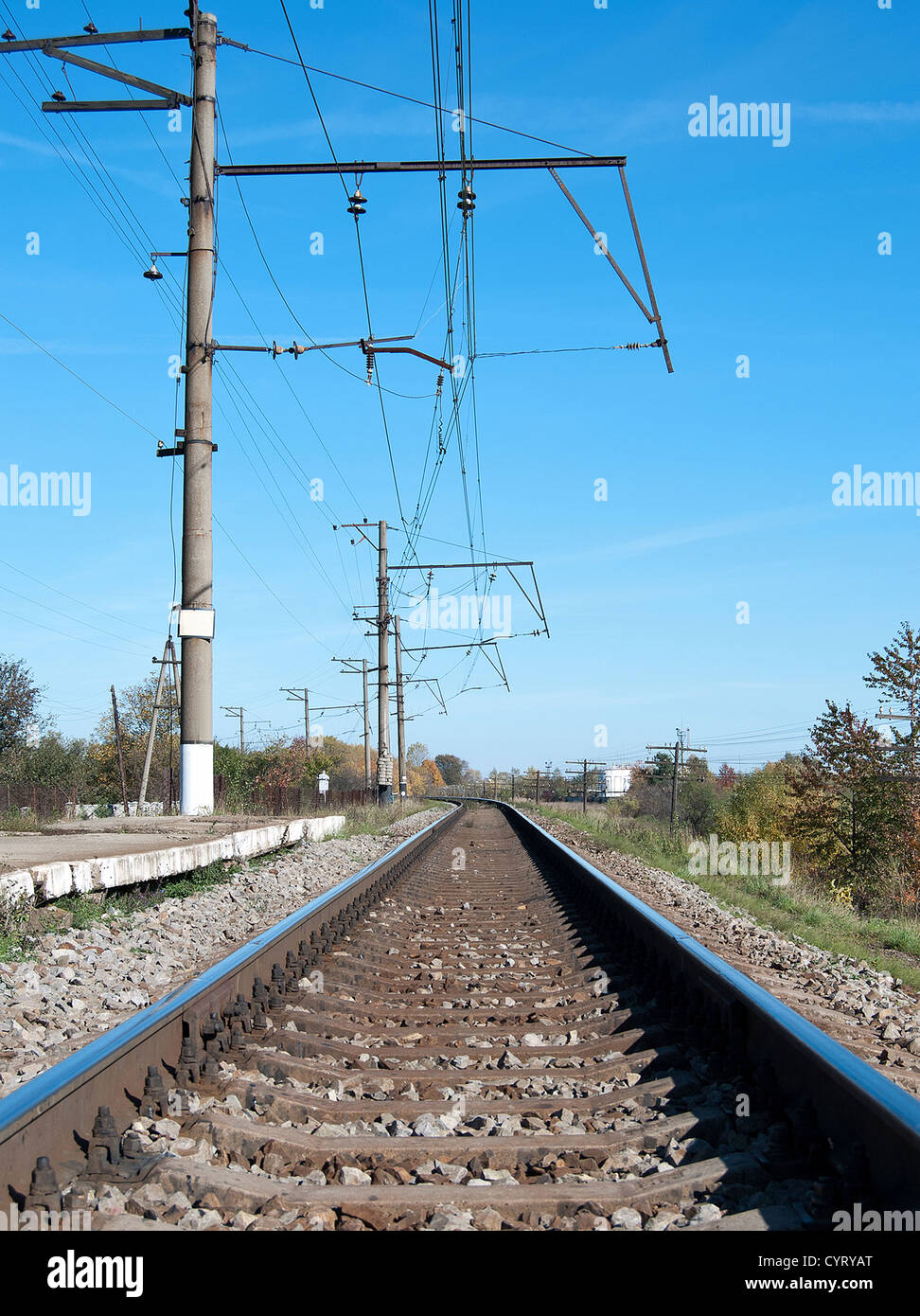 railroad track vanishing into the distance Stock Photo