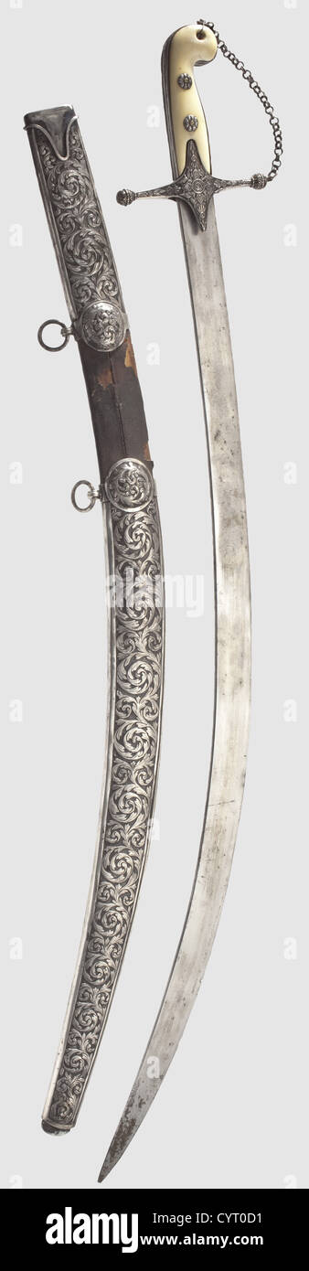 A Swedish silver-mounted sabre à la mameluke,circa 1820 Heavy,single-edged,forge-welded Damascus steel blade with the Arabic maker's mark inlaid in gold on the reverse side.Silver quillons with relief ornamentation and a side chain,loose at the pommel.Ivory grip scales with silver ferrule and decorative rivets.Wooden scabbard covered with shagreen leather and with heavy silver mountings embossed with floral designs.There are silver rings attached to both suspension bars.The quillons,chape and locket bear Swedish silver hallmarks and are stamped "TALEN,Additional-Rights-Clearences-Not Available Stock Photo