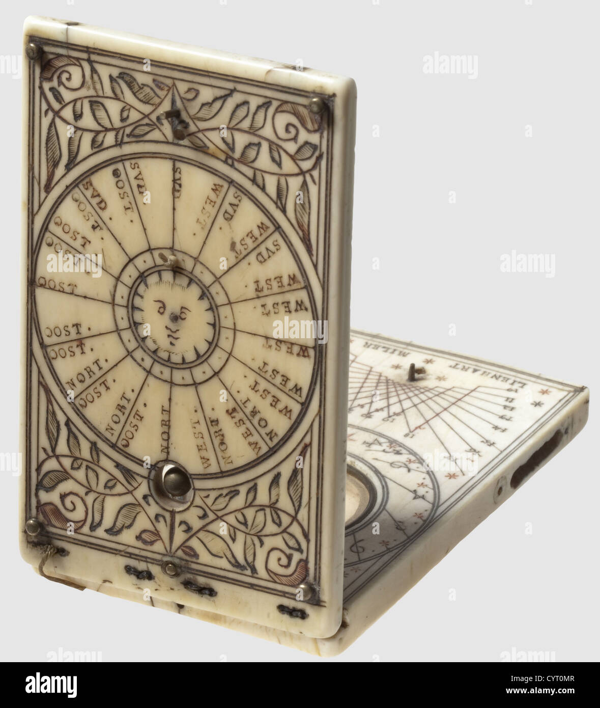A German ivory folding sundial,Nuremberg,Leonhard Miller,1617 Of rectangular form with finely engraved and chased decoration.Folding lid with wire hinges and attached plumb bob.Compass with intact glass cover,the lower edge signed 'Lienhard Miler 1617'.The left edge with a small open compartment,the cover missing.Size 9.1 x 5.2 cm.Rare,superbly crafted folding sundial with beautiful decoration from late renaissance.Leonhard Müller,sundial maker,is known to have worked in Nuremberg between 1594 and 1653.Some of his extremely elaborate ivory sundia,Additional-Rights-Clearences-Not Available Stock Photo