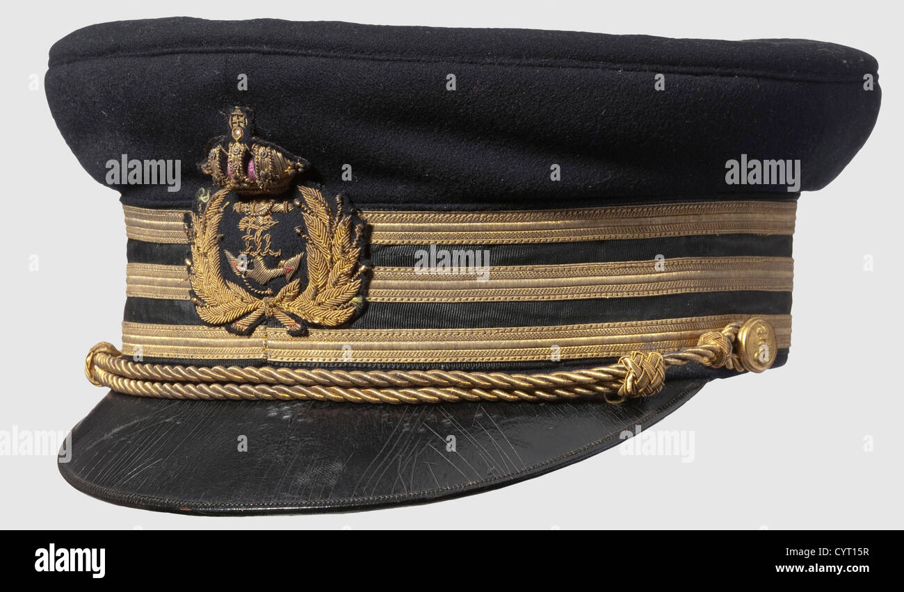 Archduke Franz Ferdinand of Austria-Este,Personal admiral's cap of  assassinated heir apparent Of blue cloth,embellished with three gold  tresses signifying rank of an admiral.The handmade navy emblem surmounted  by an imperial crown on