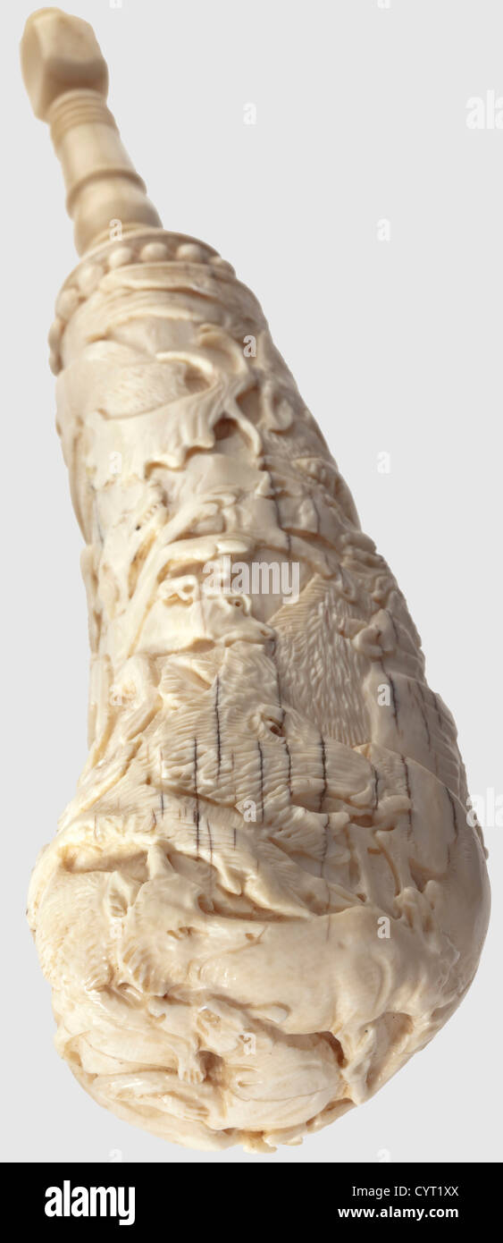 A carved ivory powder horn, German, 1st half of 18th century. Two-piece hollow horn with encircling carved, three-dimensional fighting scene depicting dogs, stags, hares, wild boars and birds. Turned spout and stopper made from ivory. Body with small shrinkage cracks. Length 20 cm, historic, historical, 18th century, powder flask, accessory, accessories, military, militaria, object, objects, stills, utilities, utility, clipping, clippings, cut out, cut-out, cut-outs, utensil, piece of equipment, utensils, Additional-Rights-Clearences-Not Available Stock Photo