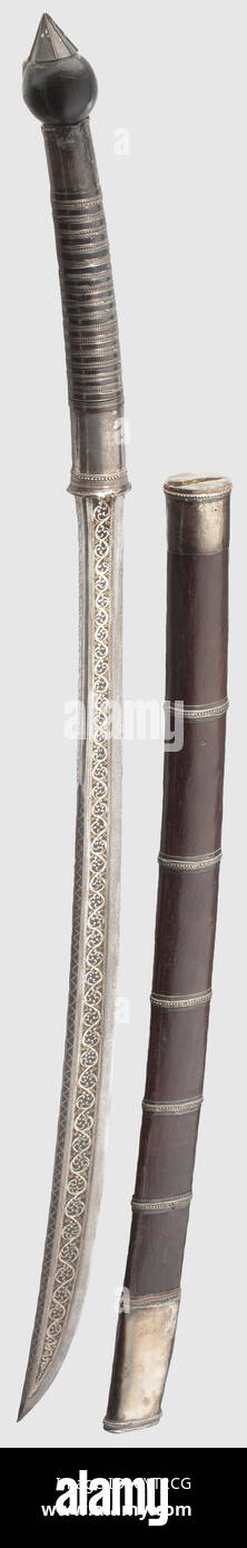 A Burmese dha with silver and gold inlay,18th/ 19th century Single-edged blade,slightly wider at the point,with fine silver and gold inlay on both sides. Silver-mounted grip wound with twisted silver and copper wire(ball finial replaced with wood). Two-piece wooden scabbard fastened with silver bands. Silver chape and locket sitting. Silver darkened. Wooden scabbard is cracked on one side of the chape. Blade with high quality decoration in fine condition. Length 90 cm,historic,historical,19th century,18th century,Indonesian archipelago,Indonesia,Far ,Additional-Rights-Clearences-Not Available Stock Photo