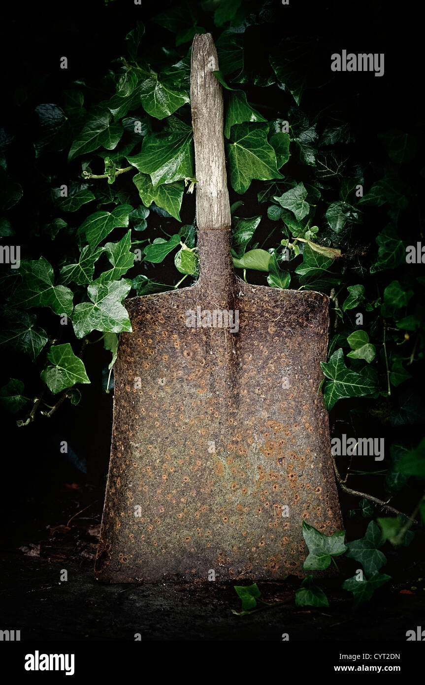 Old Shovel in an English Garden Stock Photo