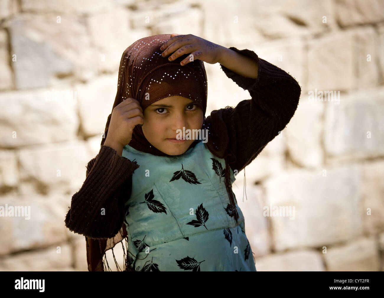 Girl Putting Her Scarf Straight, Thula, Yemen Stock Photo - Alamy