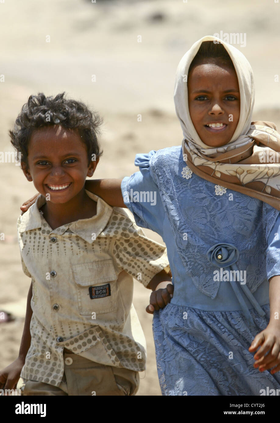 Smiling Children Running, Mocha, Yemen Stock Photo - Alamy