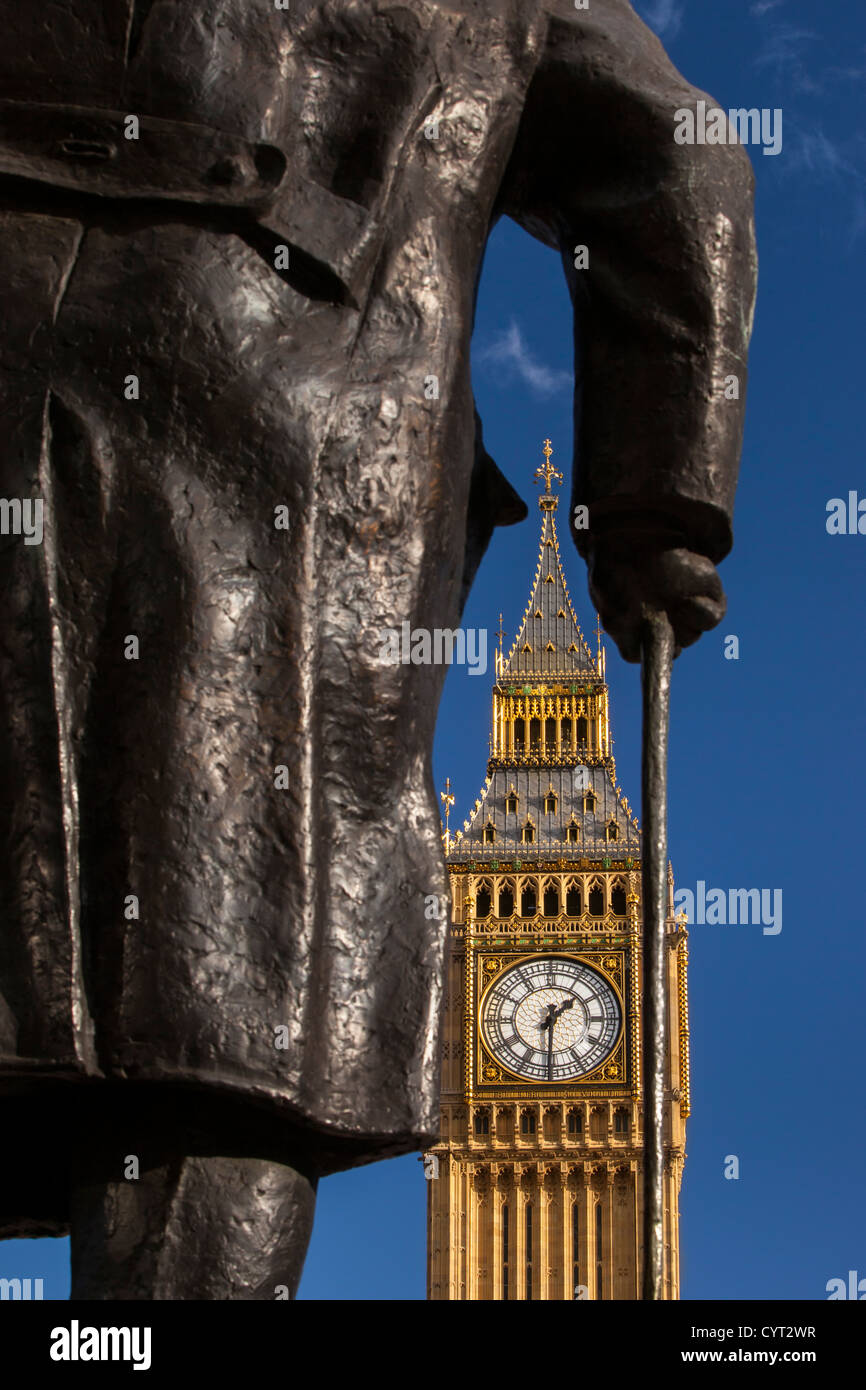 Bronze statue of Winston Churchill with Tower of big Ben beyond, Westminster, London England, UK Stock Photo