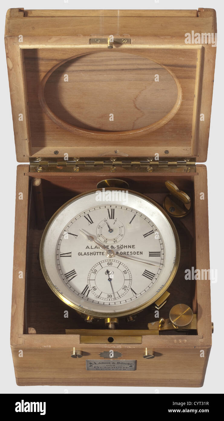 Hermann Göring(1883 - 1946),an ultra-fine marine chronometer A Lange & Sons,Glashütte,B/Dresden,No. 659. Sold in the year 1936 to the Reich Minister of Aviation Hermann Göring(copy of the original dispatch book included). Brass works,polished,silver-plated hands inlaid Roman numerals,small second-hand and 56 h power reserve indicator(blued hands),locking device,housing number 659 and maker's mark,in a matching-numbered lockable wooden case(key missing),without universal suspension,matching-numbered clock key laid in,transparent yellow plastic d,Additional-Rights-Clearences-Not Available Stock Photo