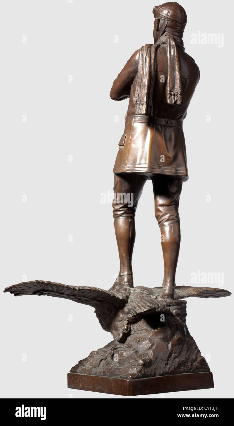 A bronze figurine, of a fighter pilot of the 3rd Flight Batallion Bronze with dark patina, the back of the base with the artistïs signature 'Bechstein 1916'. Standing on an eagle with outstretched wings a male figure in a pilotïs uniform (jacket, helmet and goggles) with folded arms, his shoulder boards showing a winged propeller surmounted by the number 3. Height 58.5 cm, fine arts, people, 1910s, 20th century, troop, troops, armed forces, army, wing, group, air force, air forces, object, objects, stills, clipping, clippings, cut out, cut-out, c, Additional-Rights-Clearance-Info-Not-Available Stock Photo