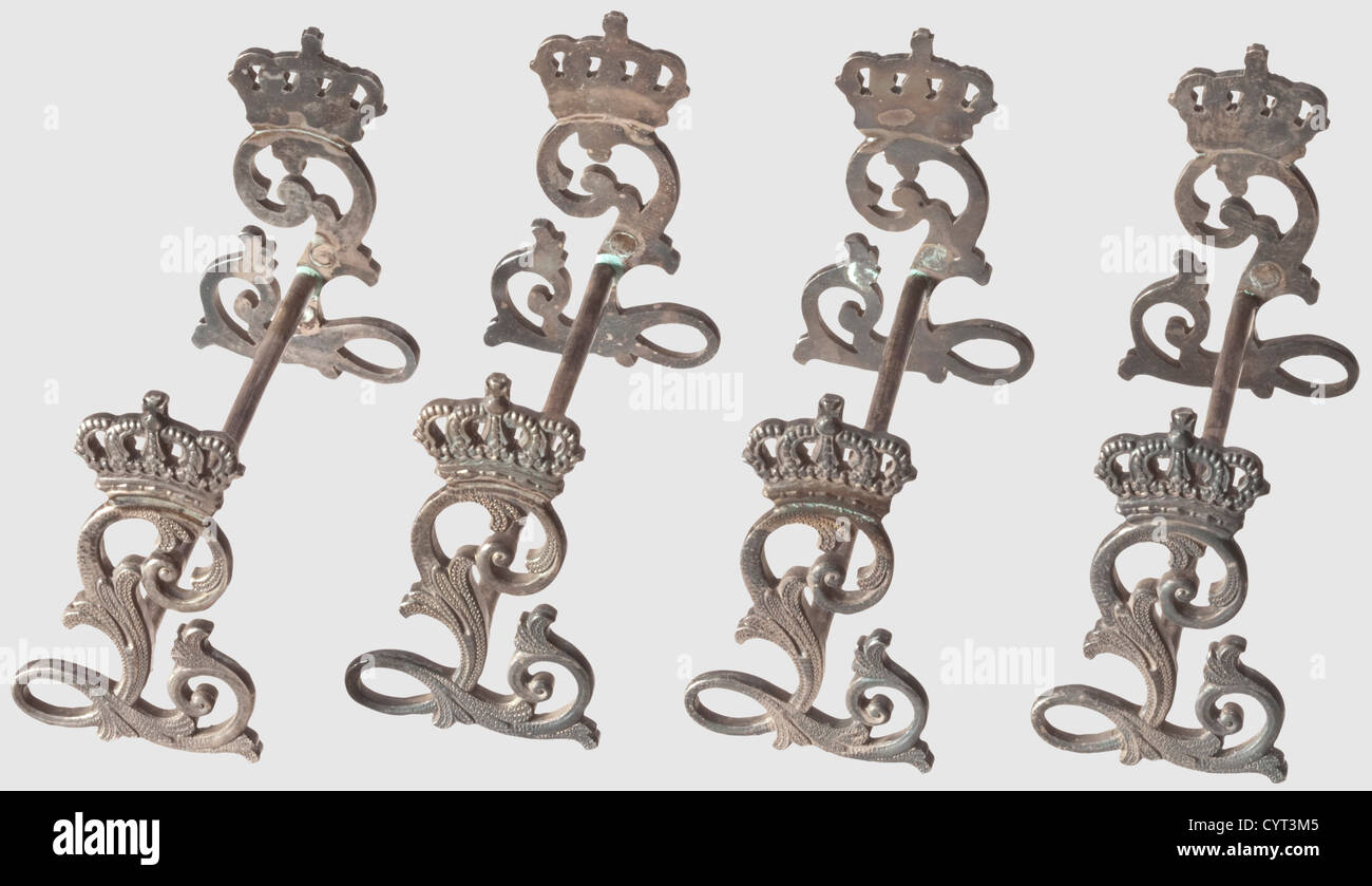 King Ludwig II of Bavaria(1845 - 1886),four little knife rests from the King's silverware Silver(tarnished). The sidewise mounts shaped like the openwork monogram 'L' underneath the royal Bavarian crown,silver crosspiece. Dimensions circa 7.5 x 5 x 2.8 cm each,total weight 123 g,historic,historical,19th century,Bavaria,Bavarian,German,Germany,Southern Germany,the South of Germany,Royal,object,objects,stills,clipping,cut out,cut-out,cut-outs,fine arts,art,art object,art objects,artful,precious,collectible,collector's item,collectib,Additional-Rights-Clearences-Not Available Stock Photo