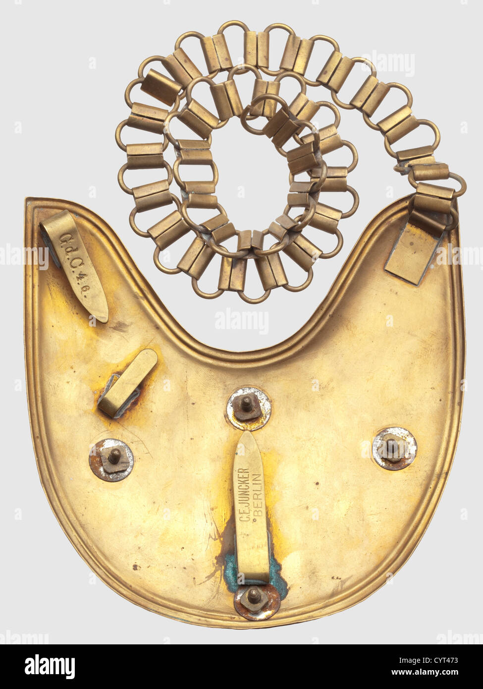 A gorget M 1912 for enlisted men,of the Regiment Garde du Corps Brass shield with white copper overlay which in turn has an applied 'FR' cipher in gold,military trophies and the years '1712','1912' and a 'WII' cipher. The emblem secured with screw-nuts on the reverse,on the retaining clamp 'G.d.C.4.6.',the lower clamp with 'C. E. JUNCKER BERLIN'. On a 46-cm length of tombak chain for wear,historic,historical,18th century,Prussian,Prussia,German,Germany,militaria,military,object,objects,stills,clipping,clippings,cut out,cut-out,cut-outs,in,Additional-Rights-Clearences-Not Available Stock Photo