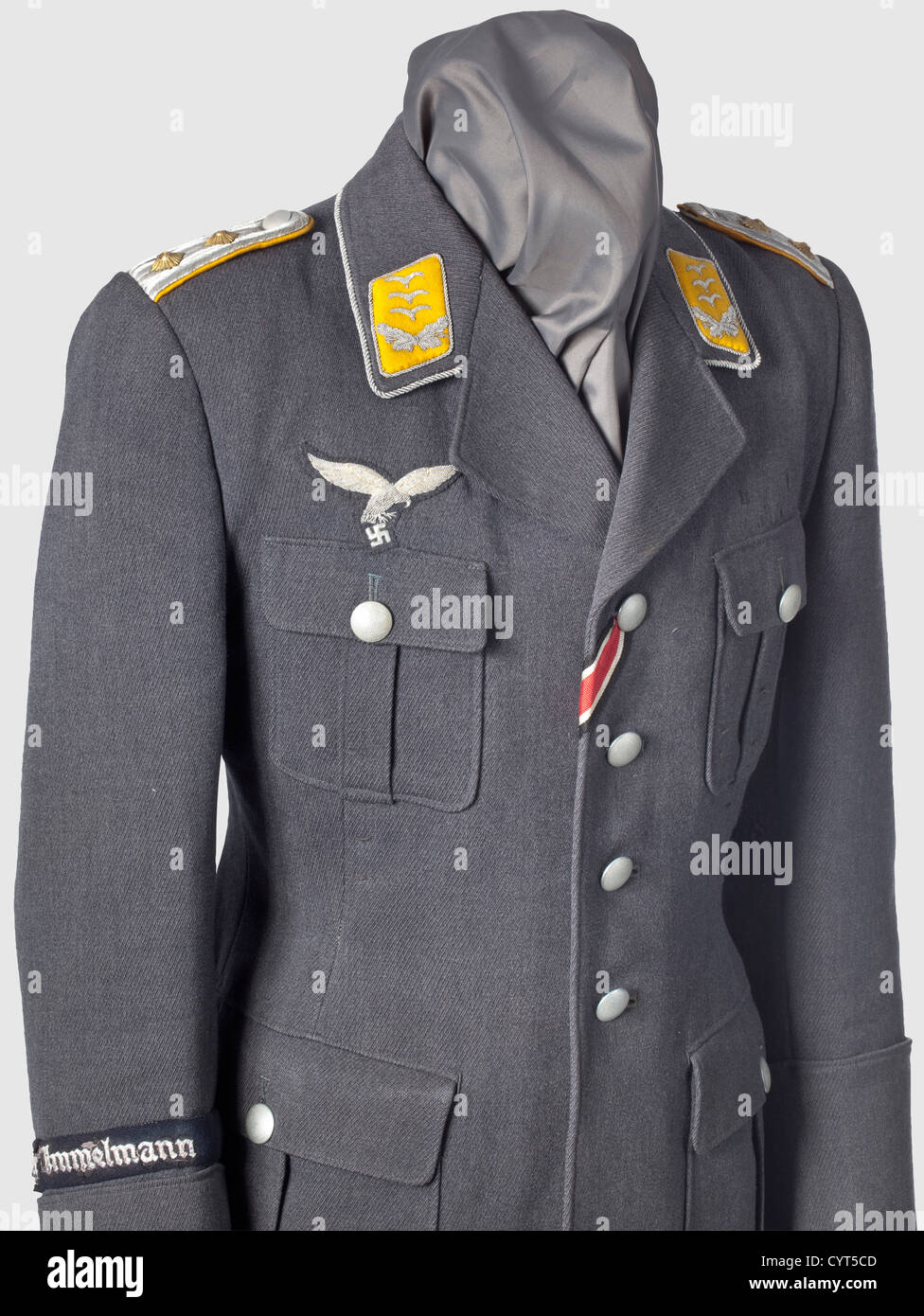 Hans-Ulrich Rudel(1916 - 1982),a uniform coat as captain Luftwaffe blue gabardine,silver buttons,bluish-grey silk liner with tailor's tag "H. Miltenberger Dresden,No. 247,1941,Oberleutnant H. U. Rudel"(typewritten),silver-embroidered breast eagle,collar tabs,sewn-in shoulder boards,silver-embroidered cuff title "Geschwader Immelmann"(stripped). Signs of usage. Included is correspondence(some copies)of Rudel and Otto Günsche with a Greek collector from whom the uniform originates(the buyer will be provided the collector's name). Further,Rudel au,Additional-Rights-Clearences-Not Available Stock Photo