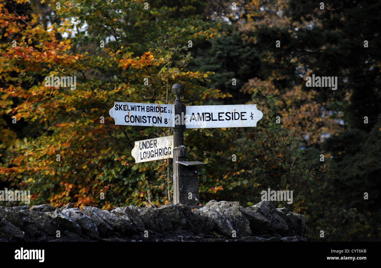 Ambleside Views in The Lake District UK Signpost to Coniston , Skelwith Bridge and Under Loughrigg Stock Photo