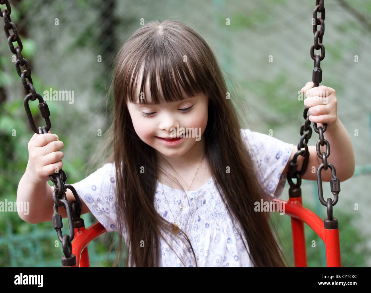 Portrait of beautiful young girl on the playground Stock Photo - Alamy