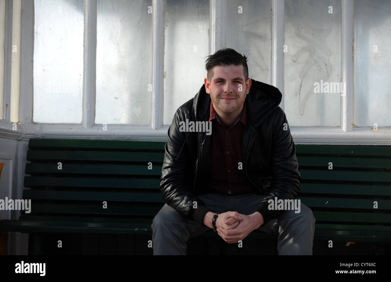 Portrait of Brighton based photographer Darren Cool photographed on Hove seafront UK Stock Photo