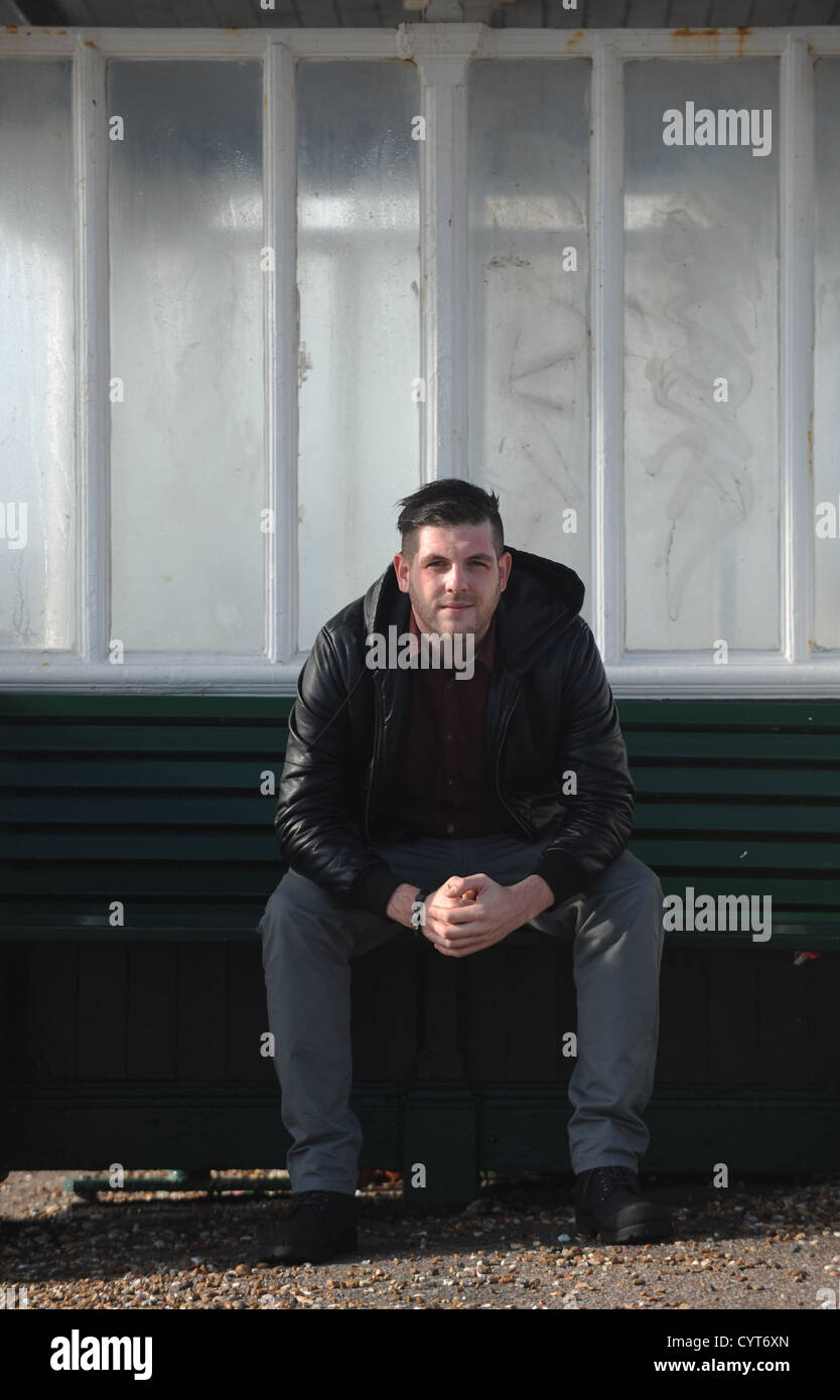 Portrait of Brighton based photographer Darren Cool photographed on Hove seafront UK Stock Photo