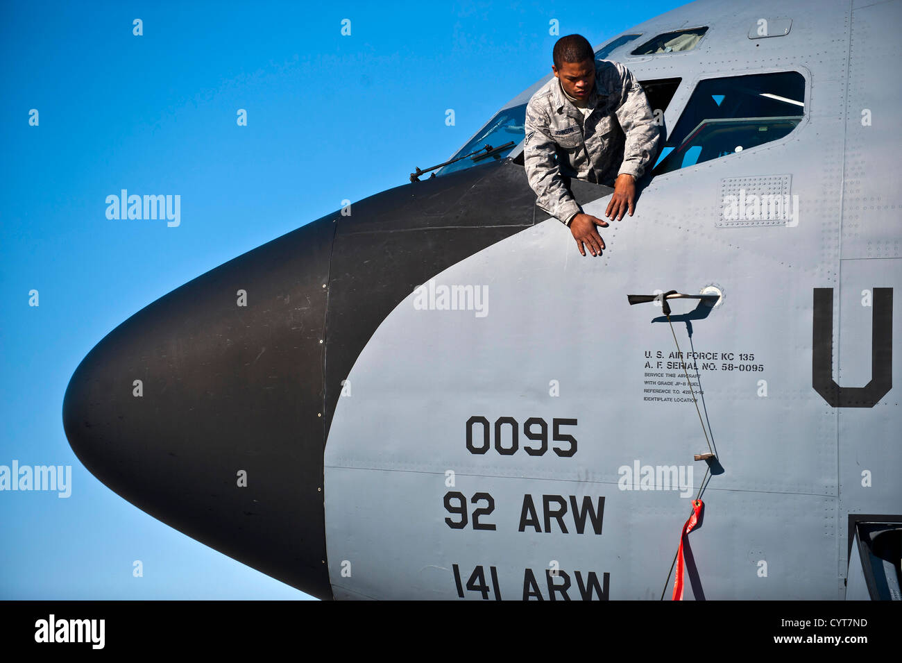 Airman 1st Class Monquavious Johnson inspects the fuselage of a KC-135 Stratotanker at the Transit Center at Manas, Kyrgyzstan, Stock Photo