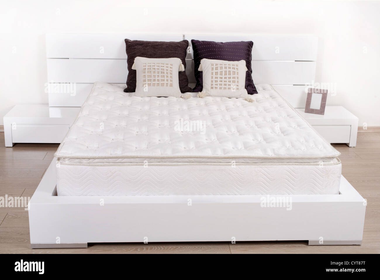 Elegant fancy white bedroom with double bed Stock Photo Alamy