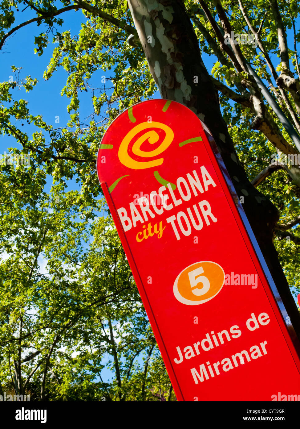 Bus stop on Barcelona City Tour tourist bus outside the Jardins de Miramar gardens Barcelona Spain Stock Photo
