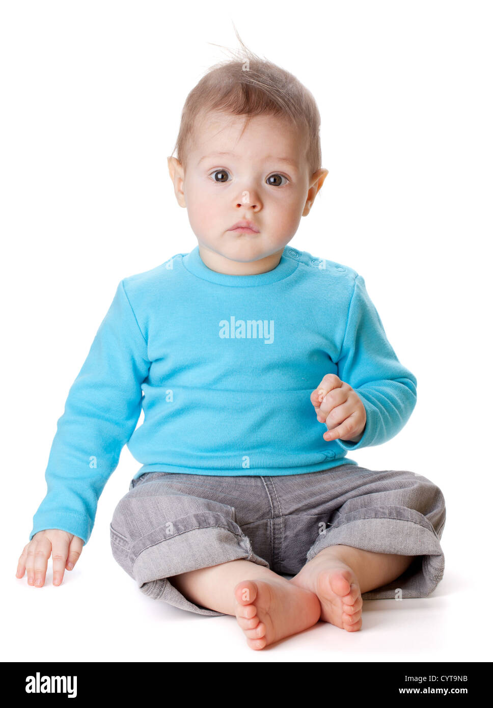 Sitting small baby. Isolated on white background Stock Photo Alamy