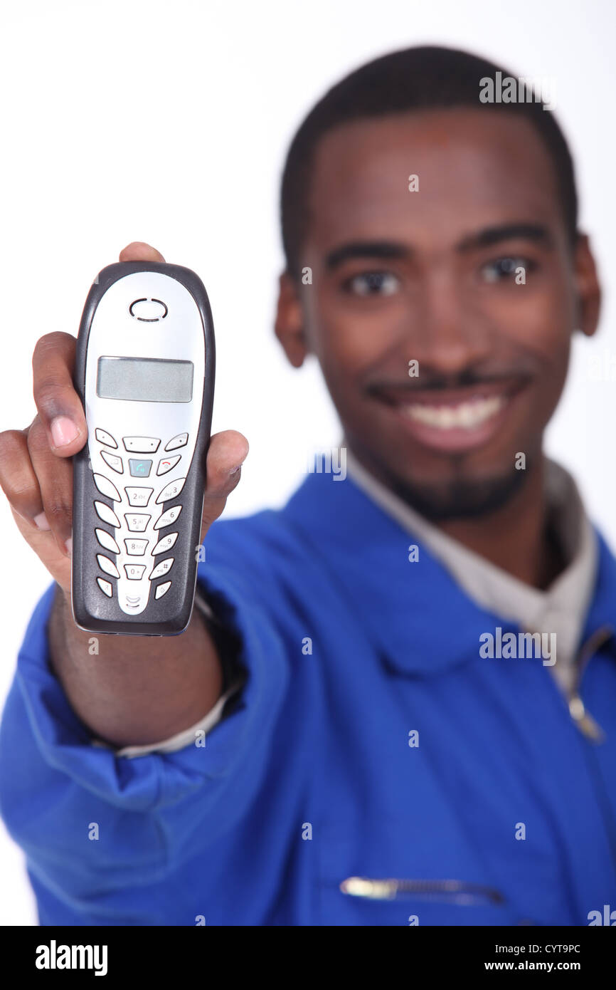 Technician showing landline phone Stock Photo Alamy