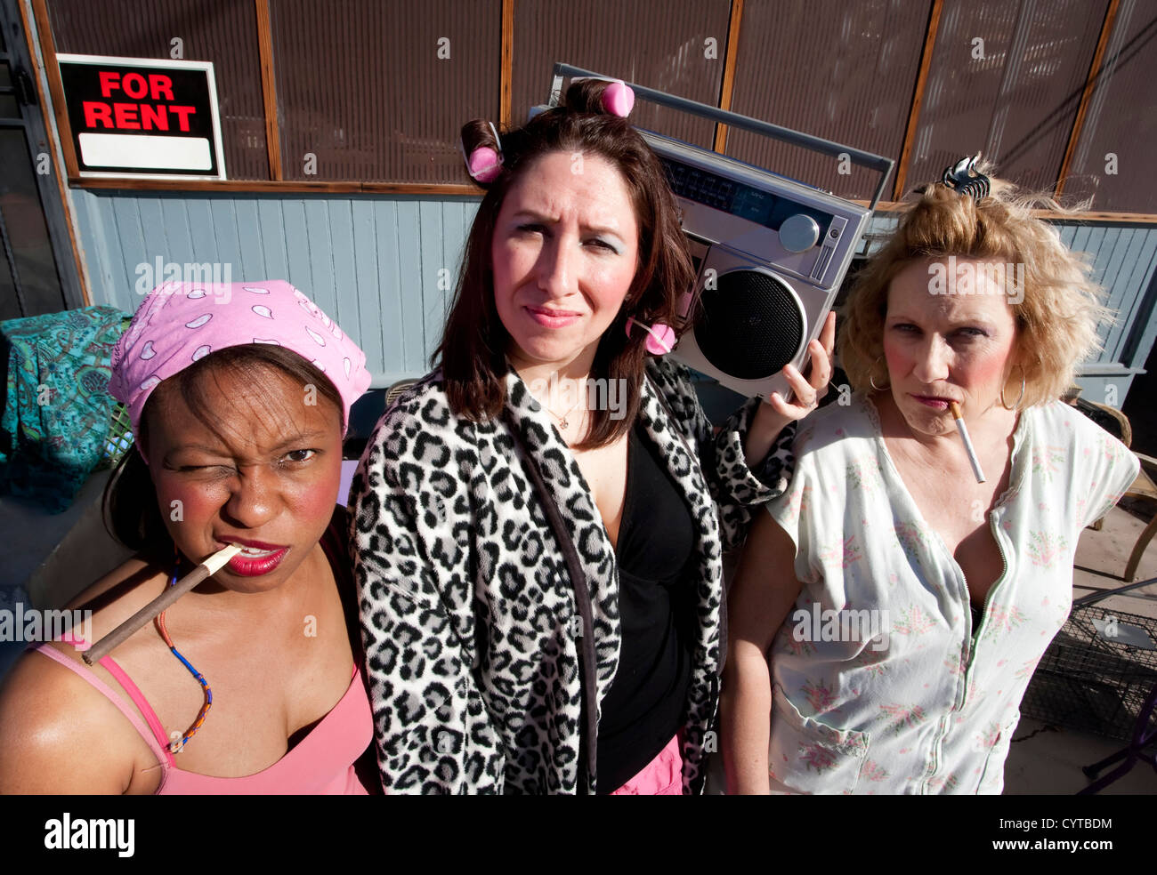Portrait of three trashy women outdoors Stock Photo Alamy
