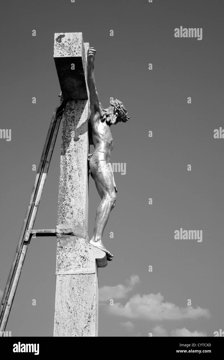 Jesus christ cross statue cemetery Black and White Stock Photos ...