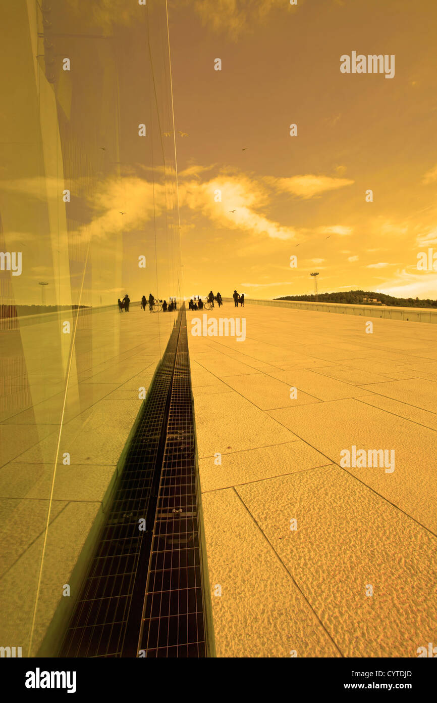 Reflection in a glass building at sunset Stock Photo - Alamy