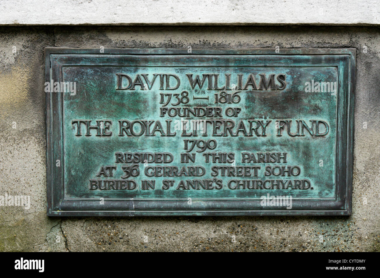 Plaque commemorating Rev David Williams, the founder of the Royal Literary Fund, in the churchyard of St Anne's, Soho. Stock Photo