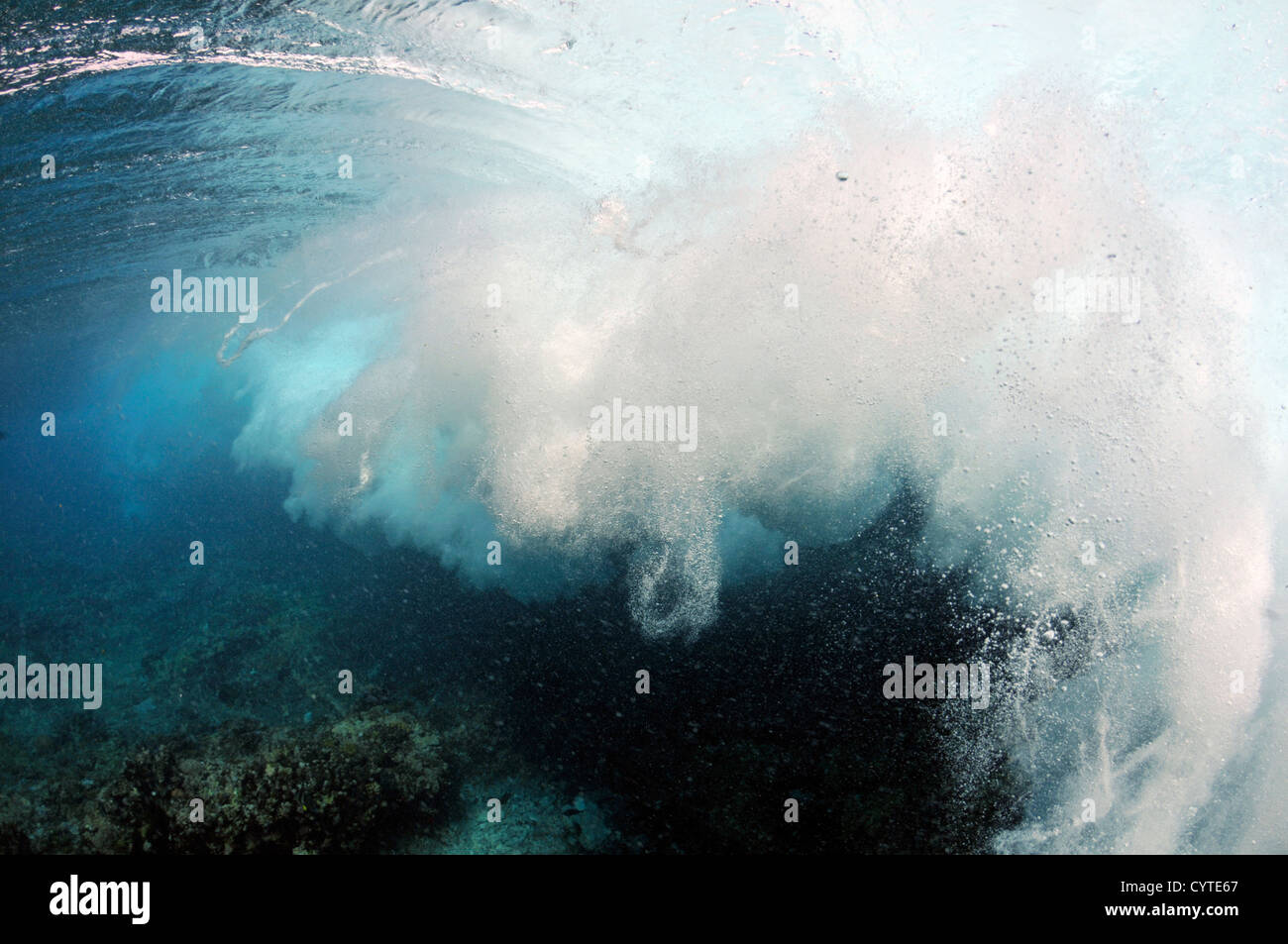 Wave breaking on reef, seen from below the surface, Palikir Pass, Pohnpei, Federated States of Micronesia Stock Photo