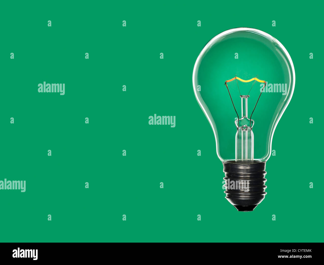 Bulb light over green Stock Photo Alamy