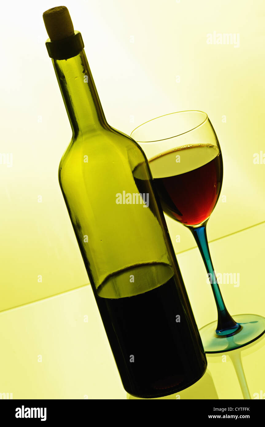 Download Bottle Of Red Wine With Glass On Yellow Background Stock Photo Alamy PSD Mockup Templates