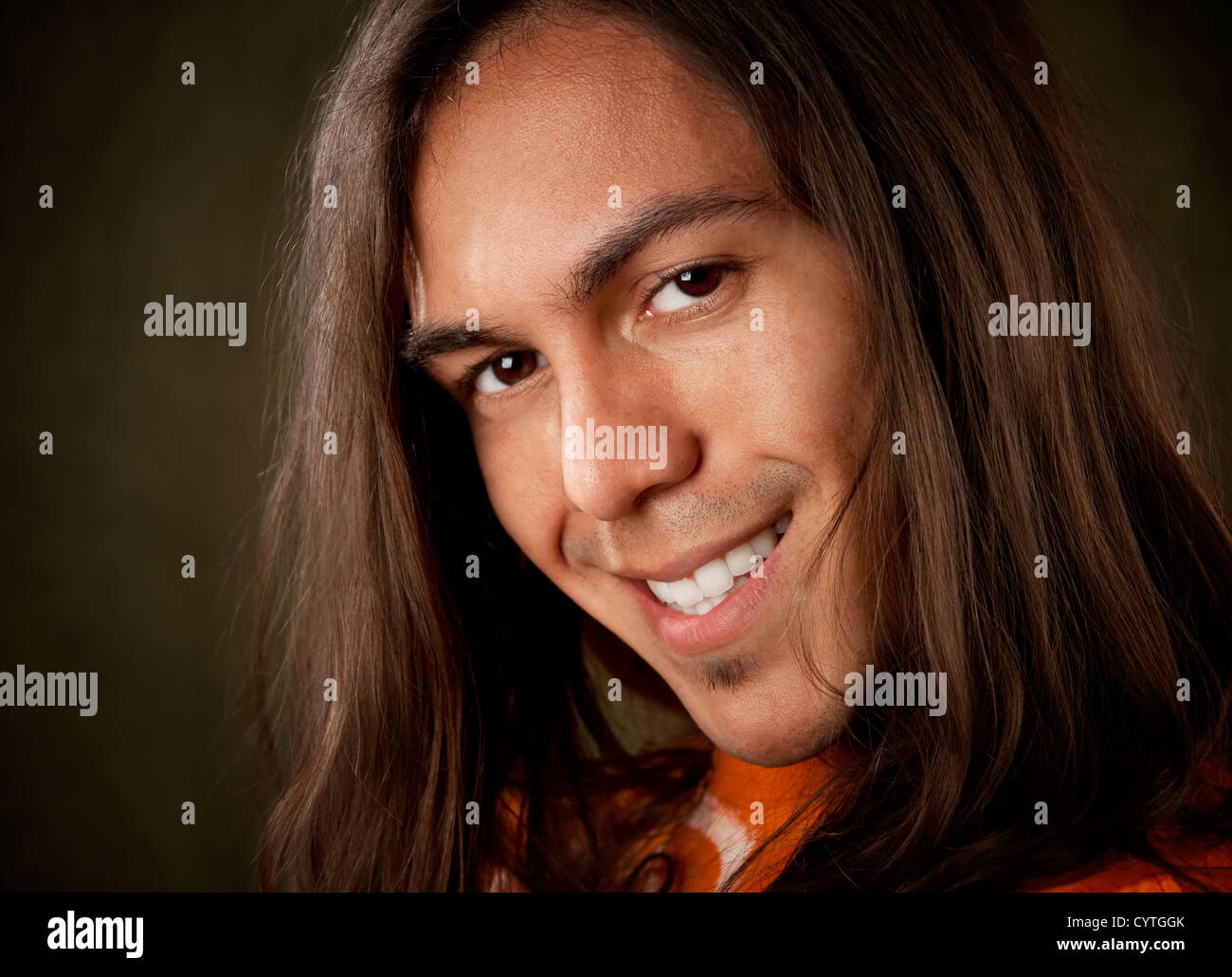 Closeup Portrait of a Handsome Young Man with Long Hair Stock Photo - Alamy
