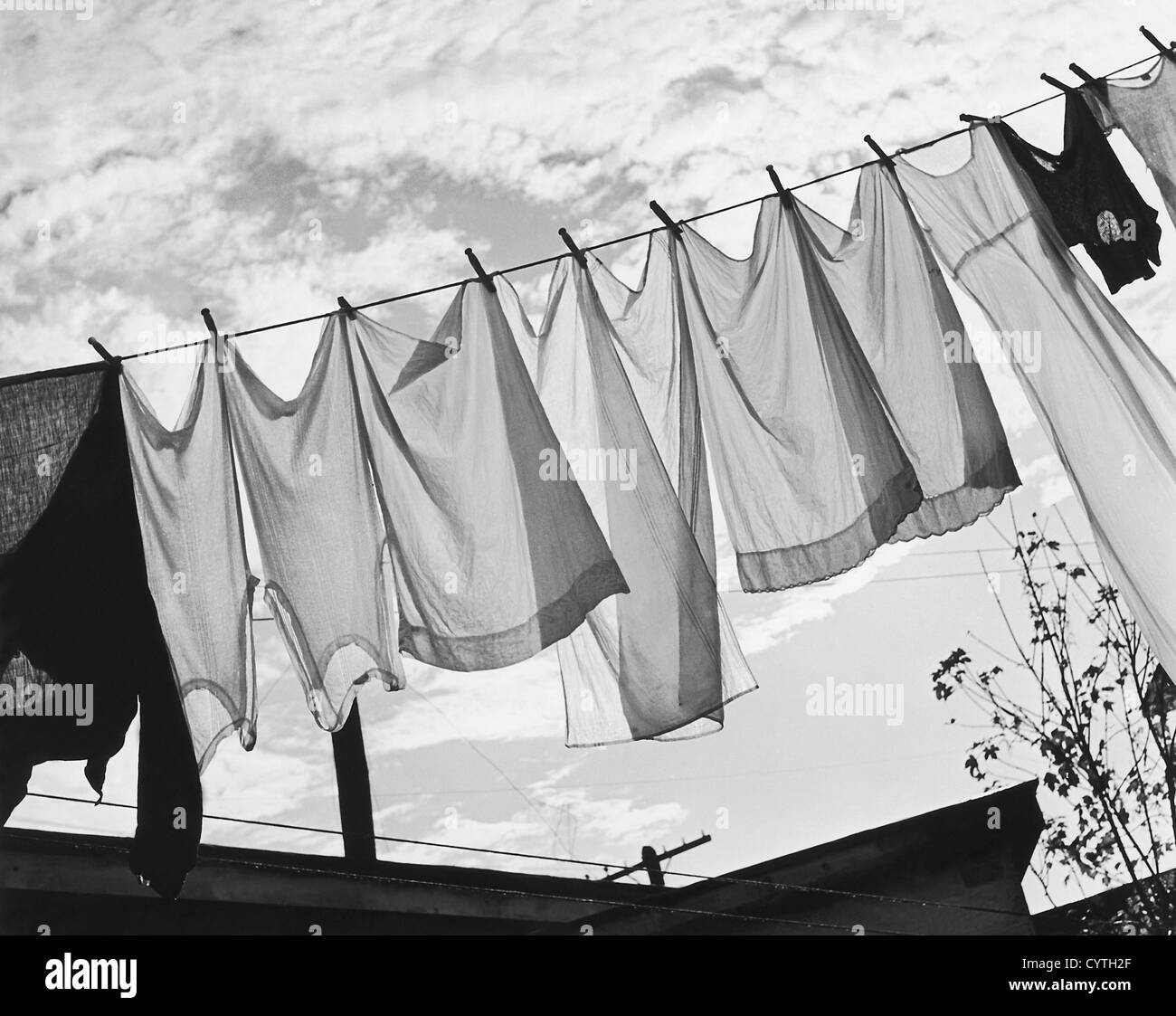 Clothes hanging on clothesline Stock Photo