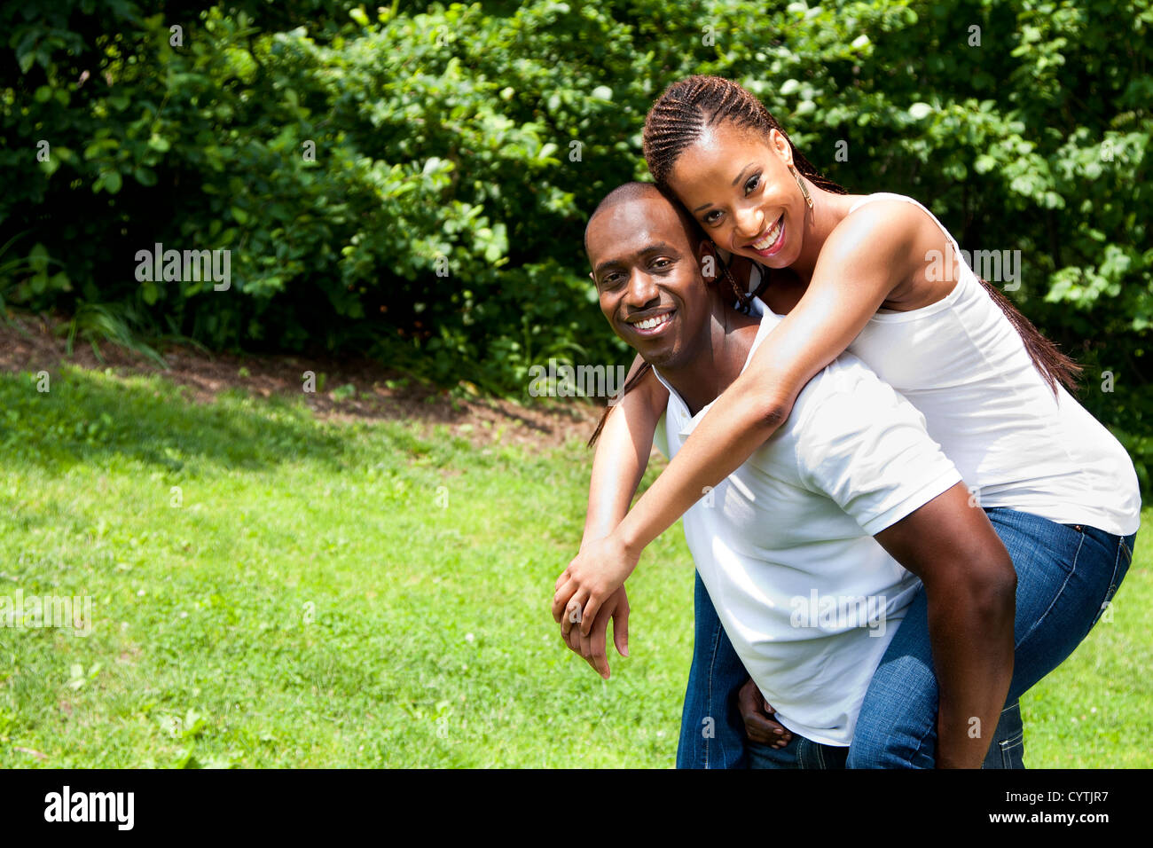 Happy smiling African couple Stock Photo - Alamy