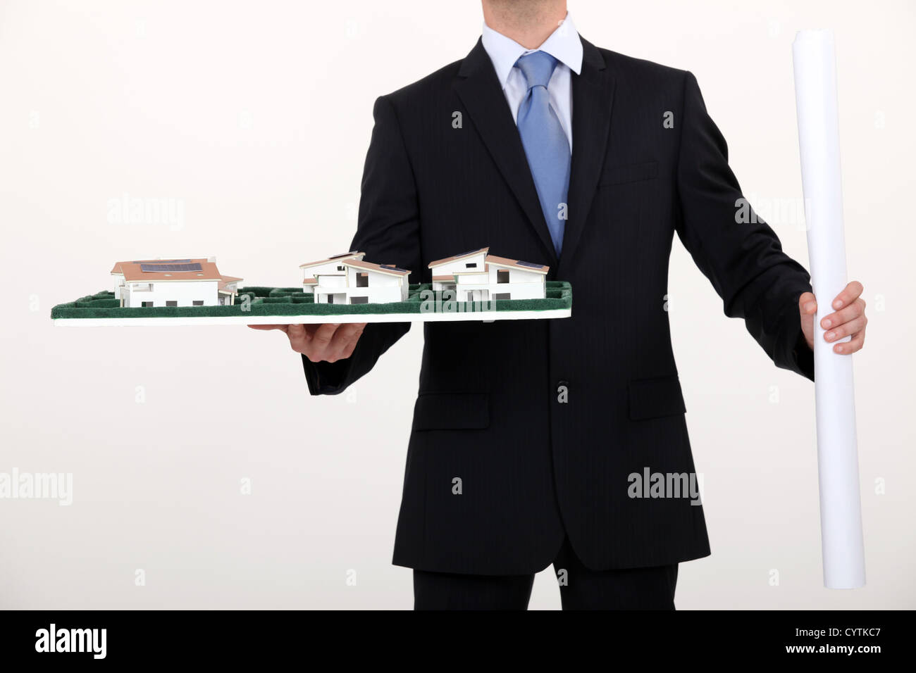 businessman holding an architectural model Stock Photo - Alamy