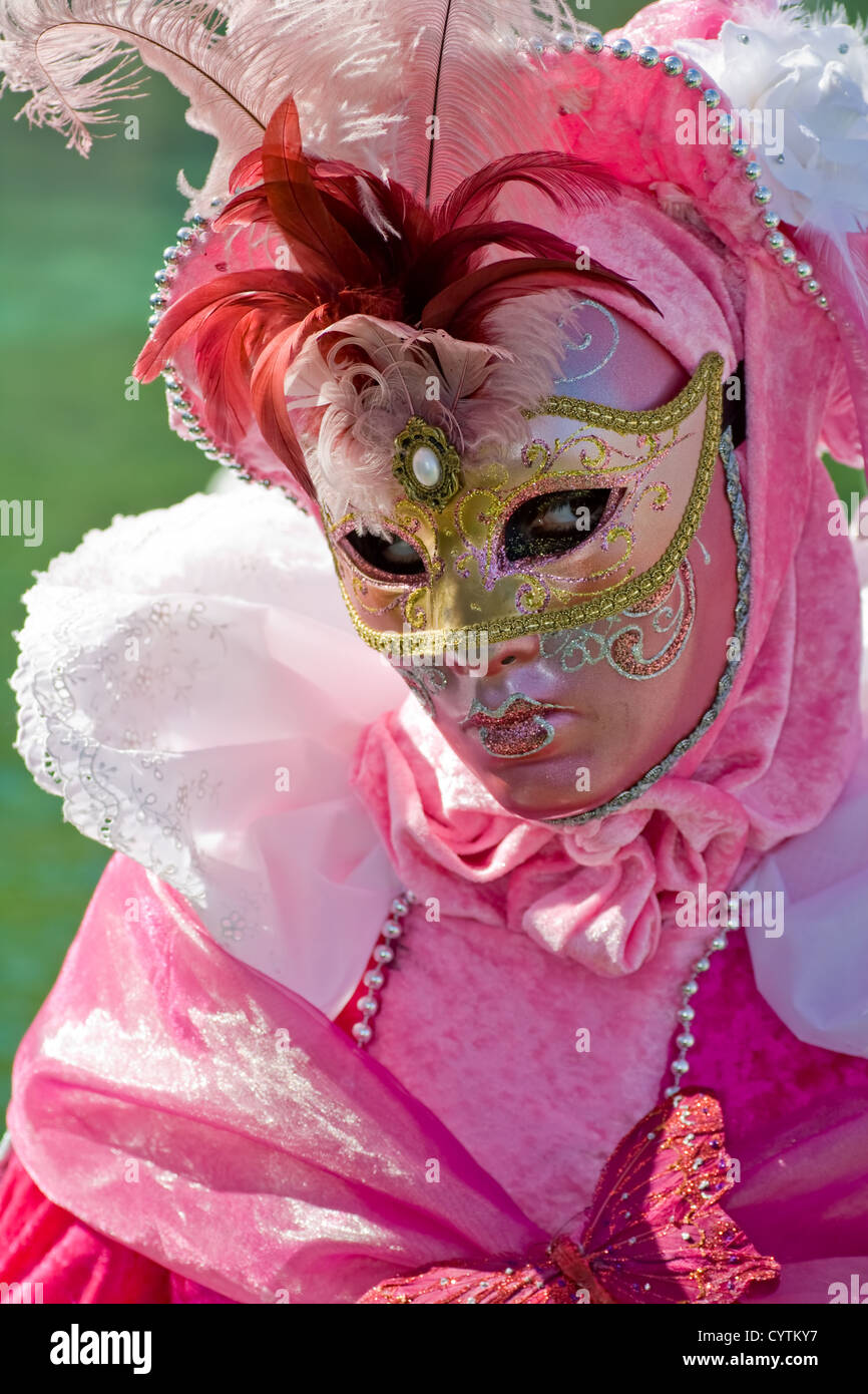 Carnival in venice with model dressed in various costumes and masks