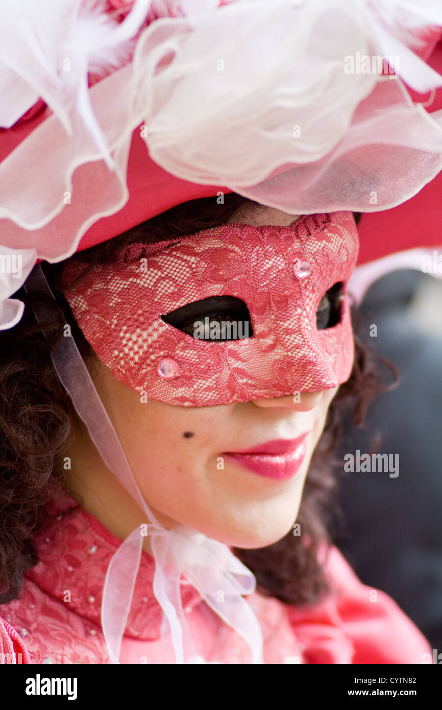 Carnival in venice with model dressed in various costumes and masks