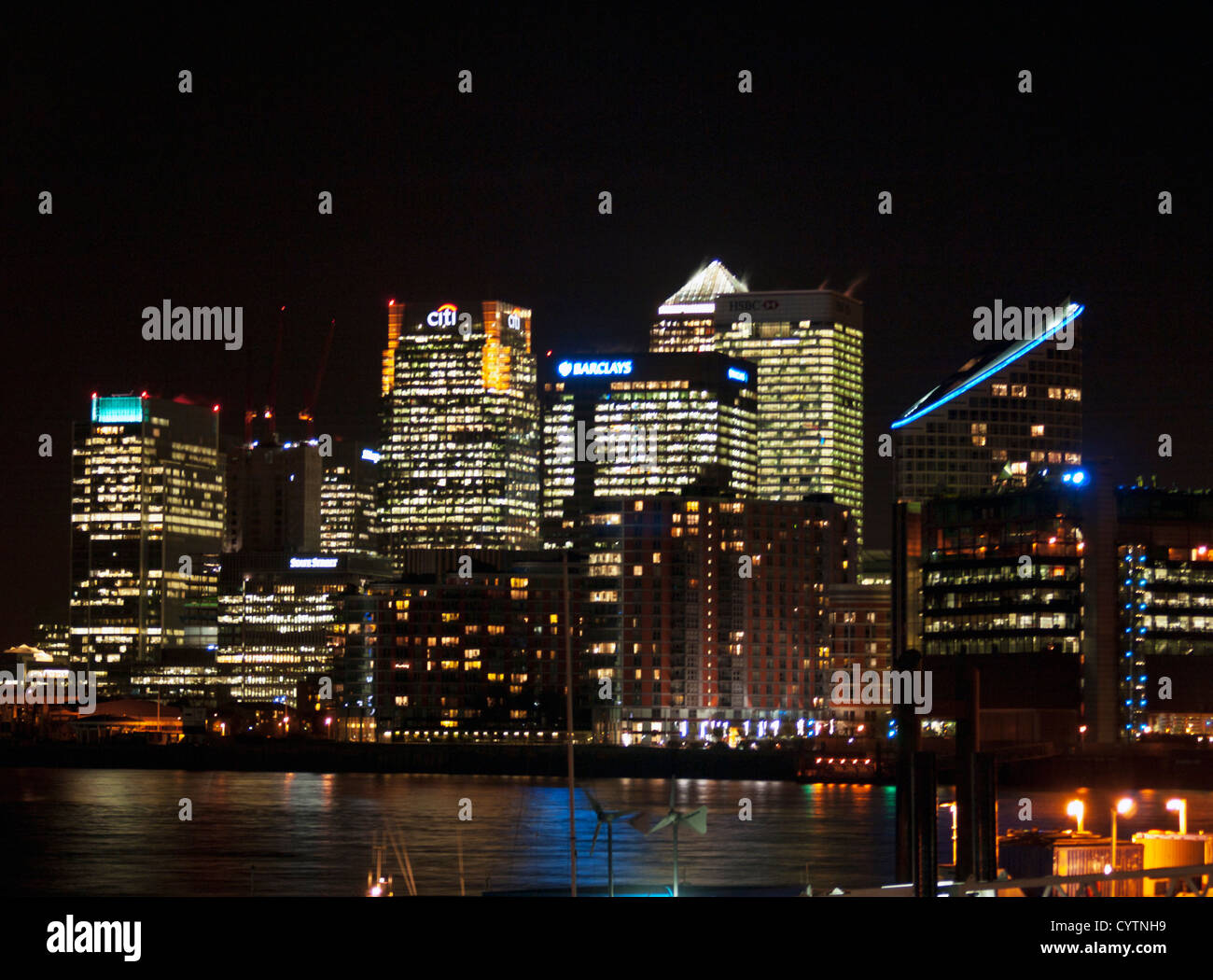Night view of Canary Wharf skyline from Trinity Buoy Wharf showing the ...