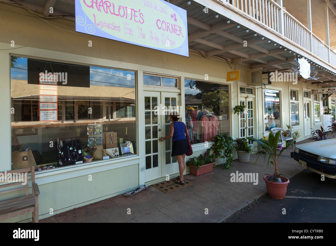 Elk2847283 Hawaii, Kauai, Hanapepe, stores with window shopping woman