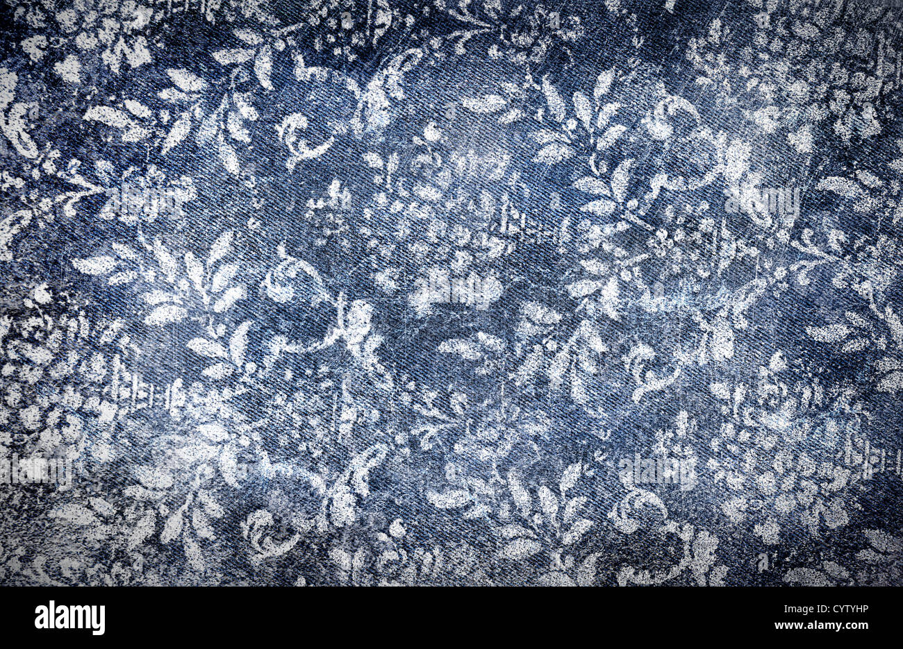 Grungy denim with faded floral effect background Stock Photo - Alamy
