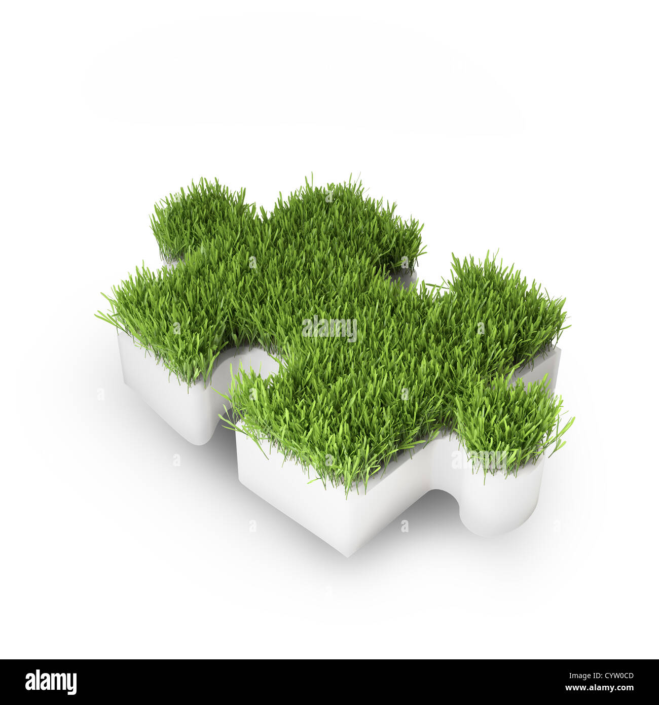 Grass covered puzzle piece ecology development concept Stock Photo