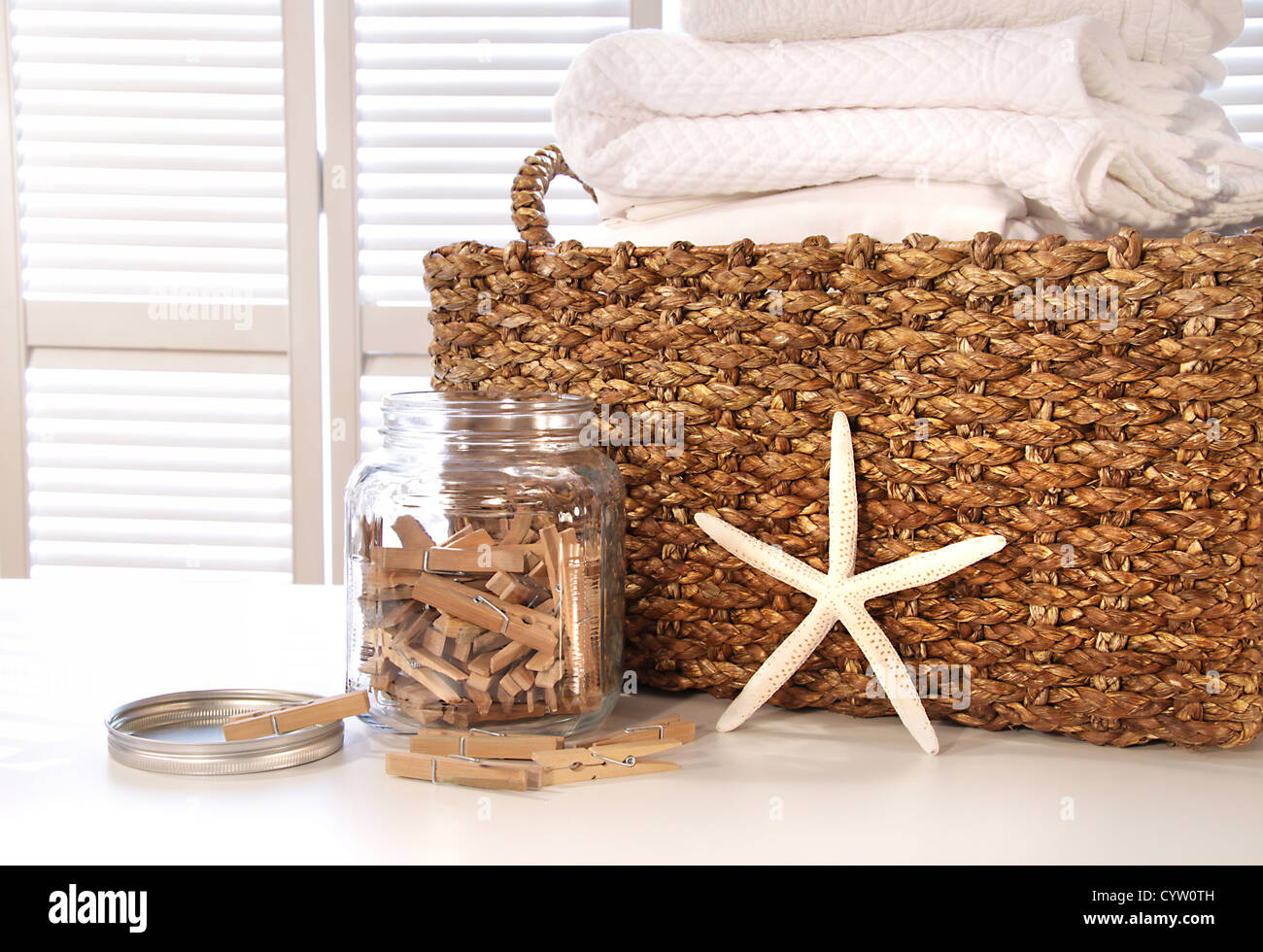 Closeup laundry basket fine linens hires stock photography and images
